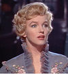Marilyn Monroe in The Prince and the Showgirl trailer cropped.jpg